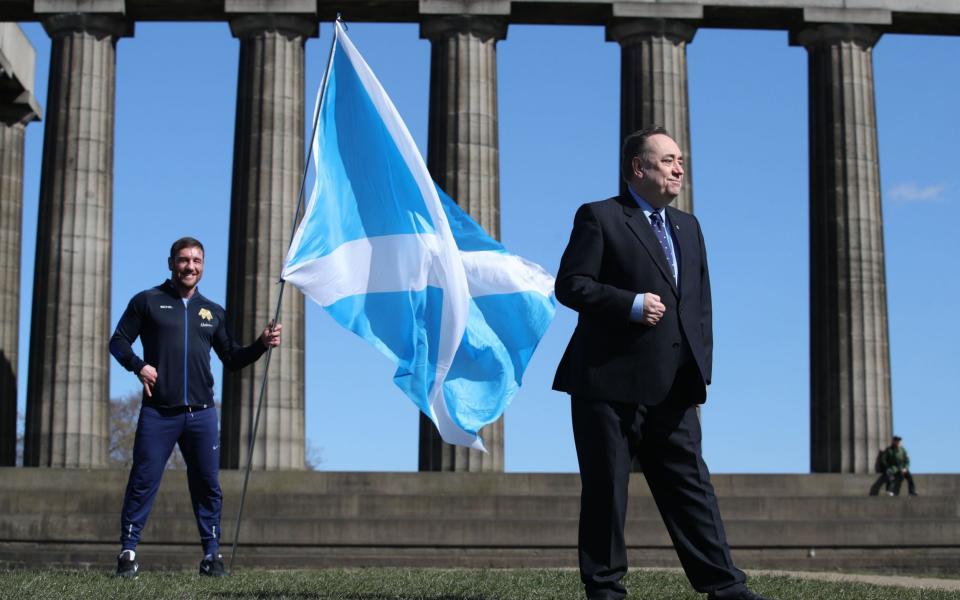 Alex Salmond (right) with former boxer and Alba Lothian candidate Alex Arthur at a photocall on Calton Hill, Edinburgh - PA