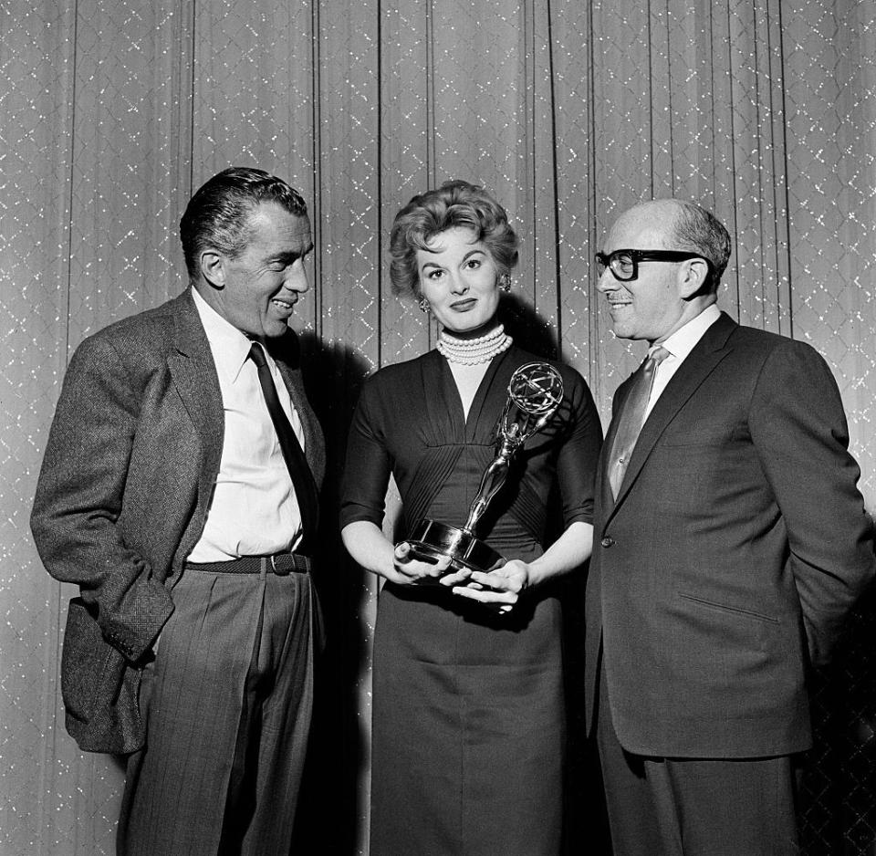 <p>Anne Jeffreys (star of <em>Topper</em> and wife of <em>Twilight Zone</em>'s Rob Sterling) holds her Emmy Award as she poses next to late-night comedian Ed Sullivan and Maxine Elliott.</p>