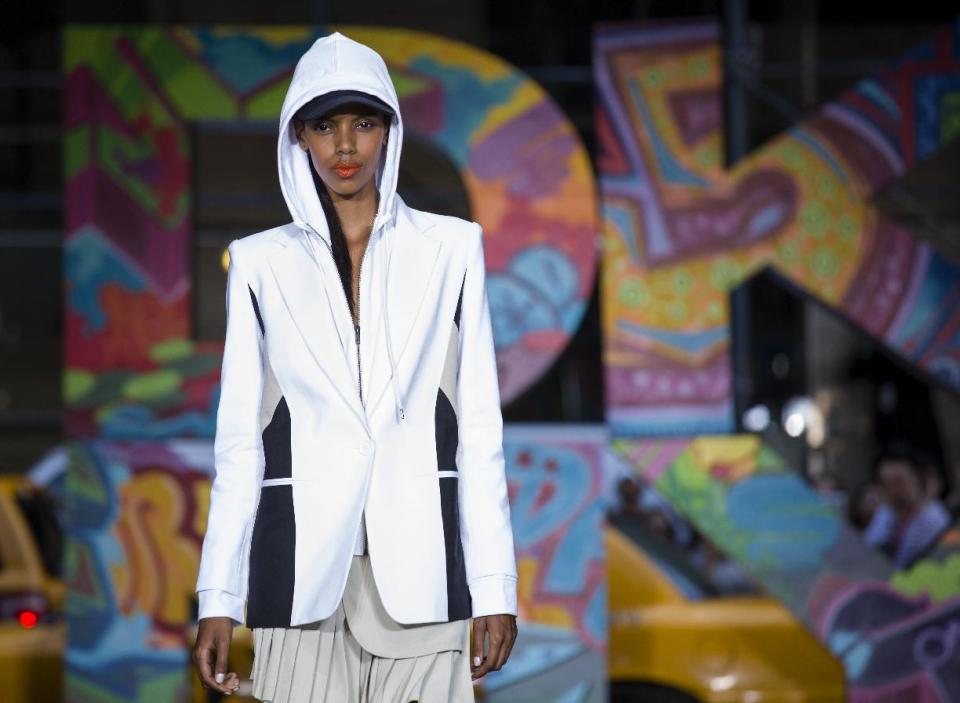 The DKNY Spring 2014 collection is modeled during Fashion Week in New York, Sunday, Sept. 8, 2013. (AP Photo/Craig Ruttle)