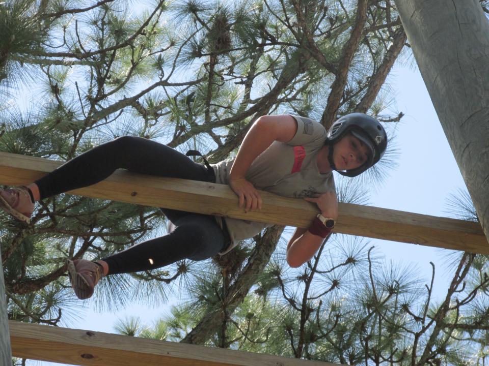 Fort Bragg spouses Ashton makes it through the "Nasty "Nick" obstacle course Wednesday, May 4, 2022, at Camp Mackall as part of the Special Forces Spouses Qualifications Course.