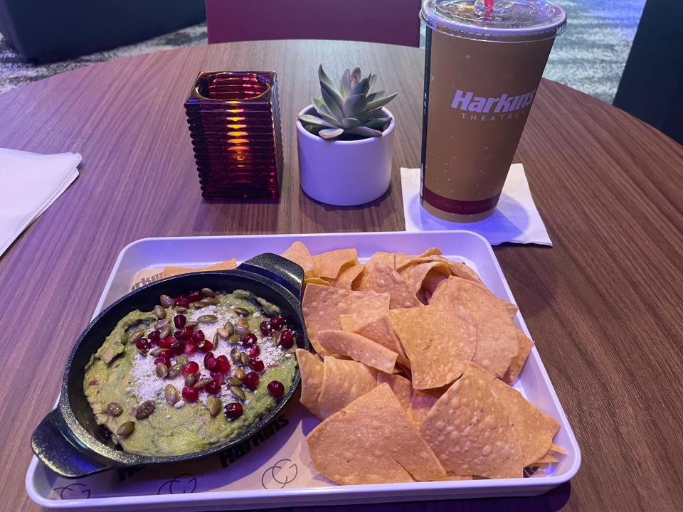 The chips and guacamole topped with pomegranate, pepitas and cotija from the Harkins Ciné Grill is my new obsession.