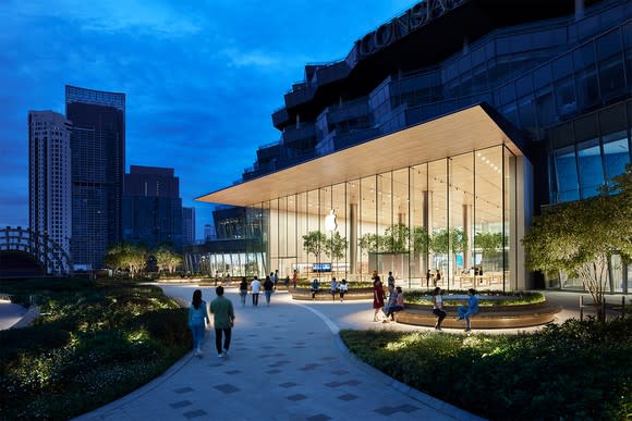 Exterior of an Apple store in Bangkok, Thailand at dusk