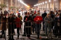 Pope Francis leads the Via Crucis (Way of the Cross) procession during Good Friday celebrations at the Vatican