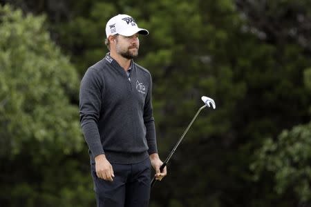 Apr 20, 2018; San Antonio, TX, USA; Ryan Moore reacts after making a birdie putt on the seventeenth green during the second round of the Valero Texas Open golf tournament at TPC San Antonio - AT&T Oaks Course. Mandatory Credit: Soobum Im-USA TODAY Sports