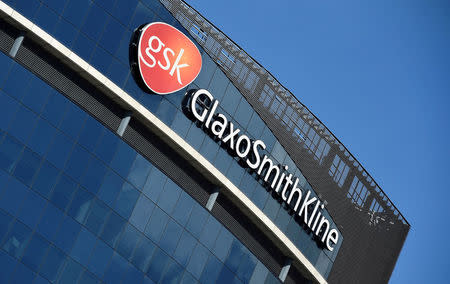 FILE PHOTO: Signage for GlaxoSmithKline is seen on its offices in London, Britain, March 30, 2016. REUTERS/Toby Melville/File Photo