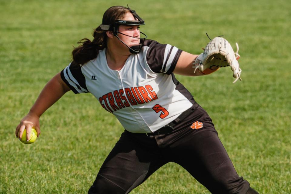 Strasburg's Emma Gilkerson fires off a throw to first after making a catch on a pop fly in the top of the fifth inning during their Division 4 State Softball Championship game against Lincolnview Saturday, June 4 at Firestone Stadium in Akron.