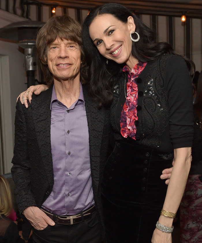 Mick Jagger (L) with the late L'Wren Scott in November 2013. Photo: Getty