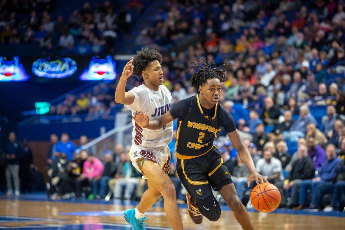 Former Woodford County boys basketball player Jasper Johnson (2) drives the ball in a game against Jeffersontown during the 2023 UK HealthCare Boys’ Sweet 16 State Basketball Tournament at Rupp Arena in Lexington, Ky., on Wednesday, March 15, 2023. Johnson now plays at Link Academy, a prep school in Missouri.