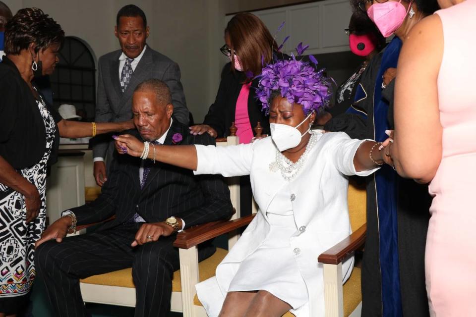 Rev. Alaric K. Hunter and his wife Iris Elaine Waters Hunter are anointed on Oct. 10. The Rev. Hunter was installed as the 10th pastor of the 125-year-old Historic Mt. Zion Missionary Baptist Church in Overtown.