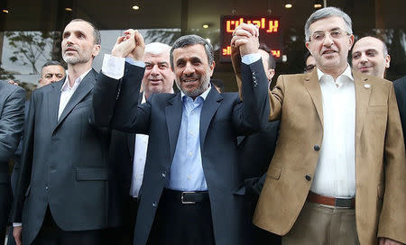 REFILE - QUALITY REPEAT Ex-Iranian President Mahmoud Ahmadinejad (C) is seen as he submits his name for registration as a candidate in Iran's presidential election, in Tehran, Iran April 12, 2017. Tasnim News Agency/Handout via REUTERS