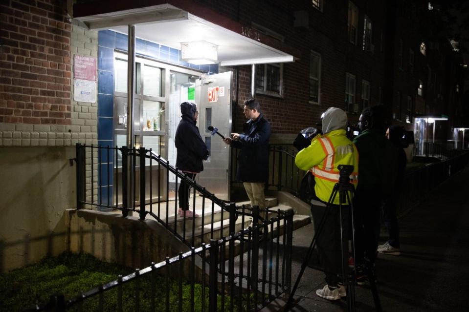 A woman speaks to the media after the shooting Wednesday. Robert Mecea