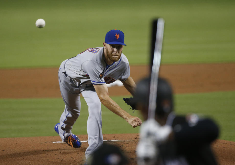 New York Mets' Zack Wheeler delivers a pitch during the first inning of a baseball game against the Miami Marlins, Friday, Aug. 10, 2018, in Miami. (AP Photo/Wilfredo Lee)