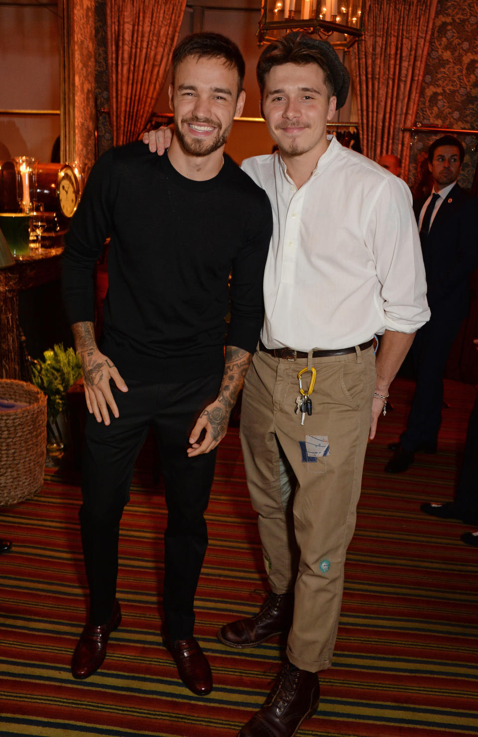 LFW: Liam Payne and Brooklyn Beckham at the Victoria Beckham 10th anniversary party