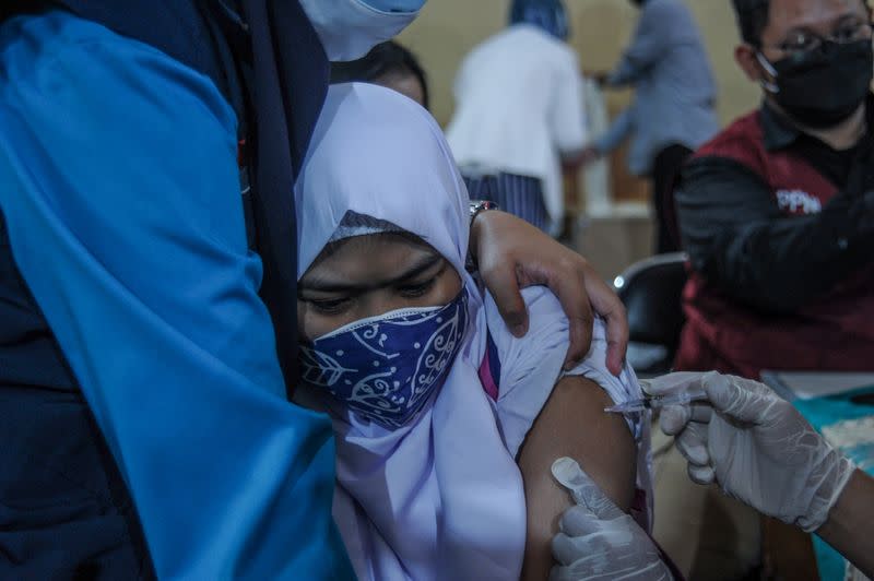 Mass vaccination program for students as COVID-19 cases surge, in Bandung