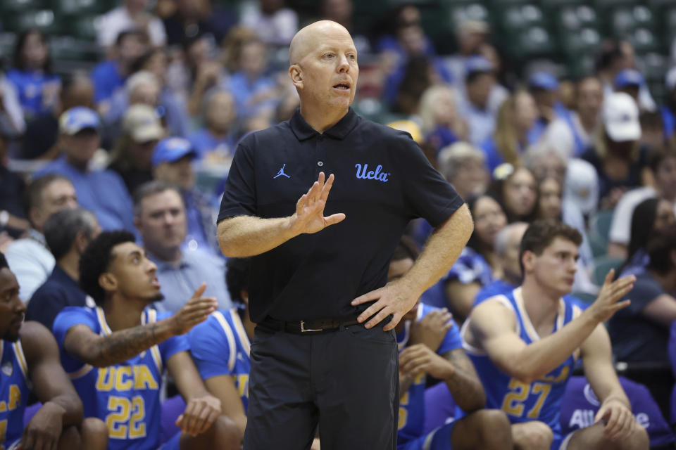 UCLA coach Mick Cronin watches the team play against Chaminade during the second half of an NCAA college basketball game Tuesday, Nov. 21, 2023, in Honolulu. (AP Photo/Marco Garcia)