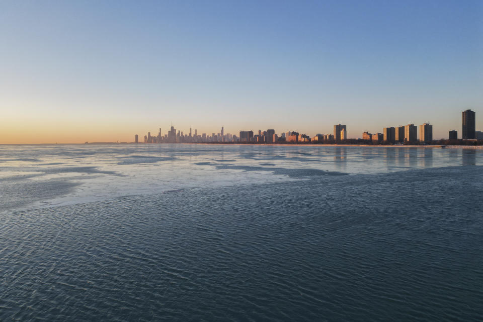 A layer of ice covers Lake Michigan, Thursday, Feb. 2, 2023, in Chicago. (AP Photo/Erin Hooley)
