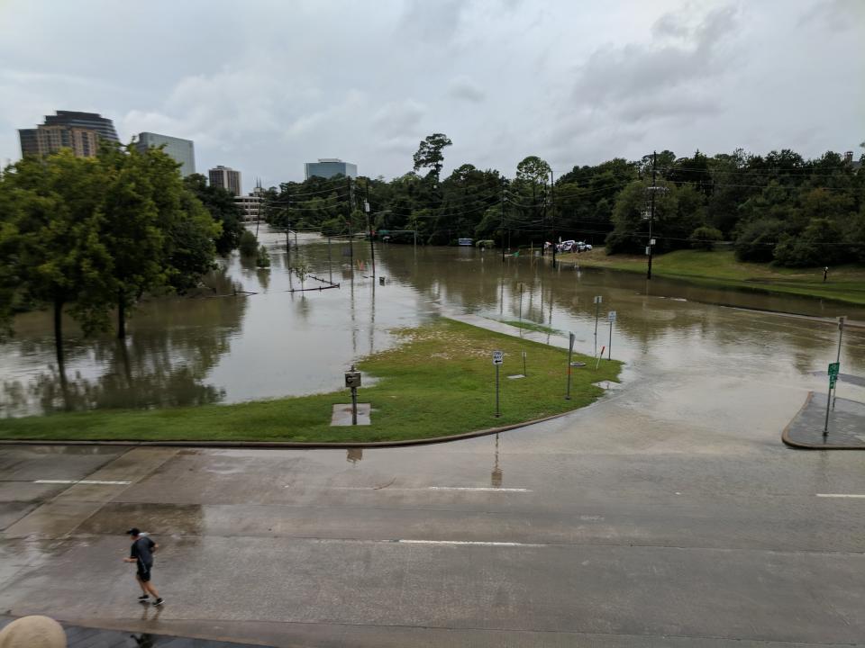 A partially submerged street in Katy, Texas. (Photo: Roque Planas/HuffPost)