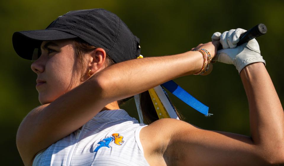 Castle’s Leena Rice tees off on the fourth hole Friday, Oct. 4, 2024, during round one of the 2024-25 IHSAA girls golf state championships at Prairie View Golf Club in Carmel, Indiana.Friday, Oct. 4, 2024,