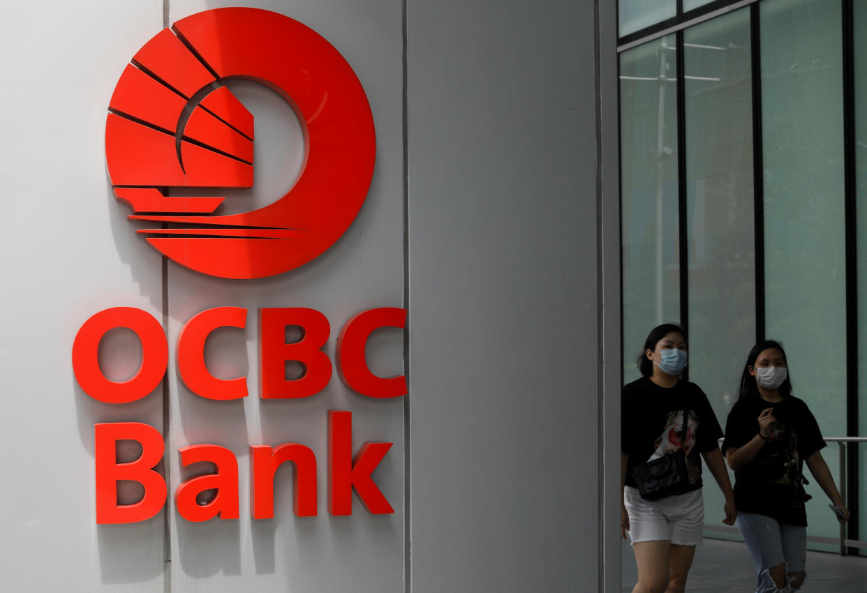 Over 30 SMS phishing victims have received goodwill payouts so far, OCBC says. (PHOTO: REUTERS/Edgar Su)