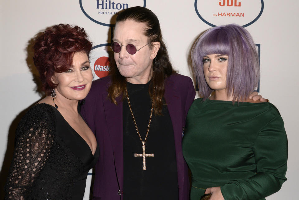 From left, Sharon Osbourne, Ozzy Osbourne and Kelly Osbourne arrive at the 56th annual GRAMMY awards - salute to industry icons with Clive Davis, on Saturday, Jan. 25, 2014, in Beverly Hills, Calif. (Photo by Dan Steinberg/Invision/AP)