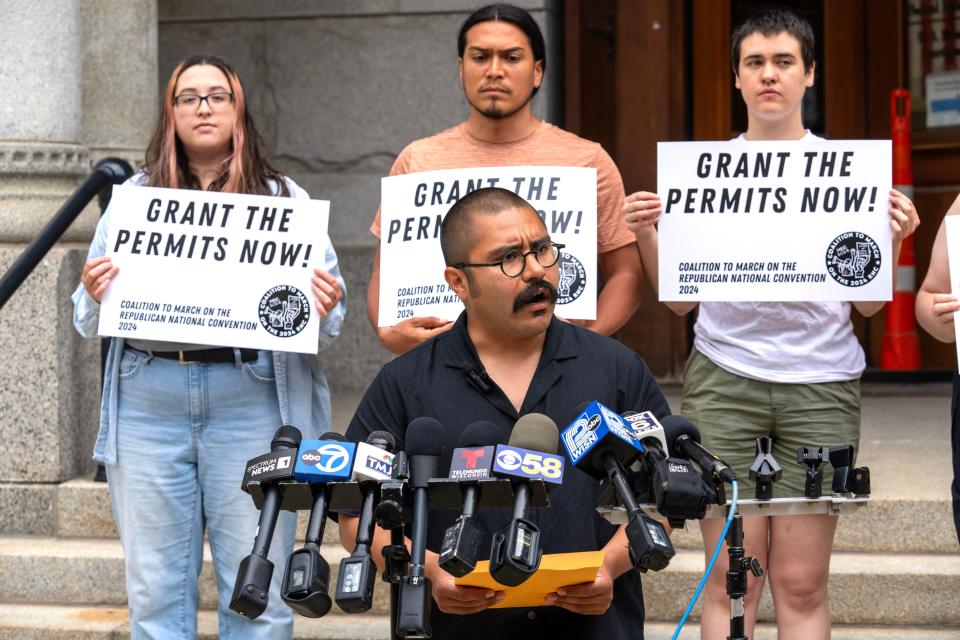 Omar Flores criticizes proposed protest routes during a news conference by the Coalition to March on the RNC Friday, June 21, 2024 outside the federal courthouse in Milwaukee, Wisconsin. Authorities on Friday released the boundaries of the credentials-only area for next month's Republican National Convention in downtown Milwaukee in addition to demonstration areas that will surround it.