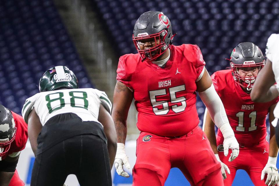 Toledo Central Catholic lineman Marc Nave gets in position before a play against Detroit Cass Tech during the second half of the CHSL Prep Bowl at Ford Field in Detroit on Oct. 21. Nave committed to Kentucky on Nov. 16.