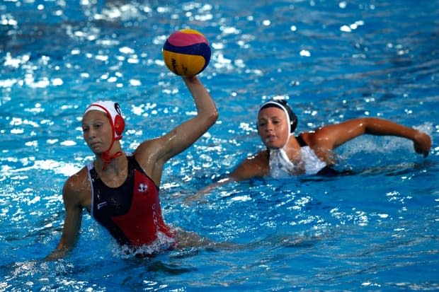 Canada's Kyra Christmas, left, pictured competing at the FINA world championship in 2017, will take part in the upcoming exhibition series against the Americans this week.    (Adam Pretty/Getty Images - image credit)