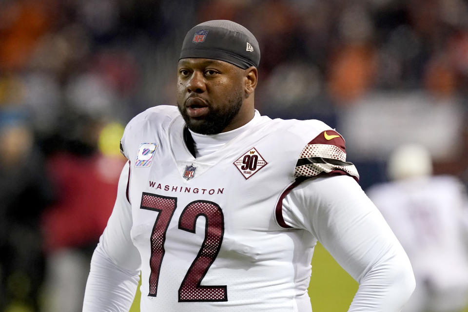 FILE - Washington Commanders offensive tackle Charles Leno Jr. looks across the first before the start an NFL football game against the Chicago Bears, Oct. 13, 2022, in Chicago. Much like many of Twitter's hundreds of millions of users, professional sports stars are also dealing with the chaos and uncertainty surrounding the microblogging app since Elon Musk took it over and began trimming the staff and making other changes. Even the people paid to advise the athletes are not necessarily sure how to proceed as Twitter evolves — or maybe goes away entirely. (AP Photo/Charles Rex Arbogast)