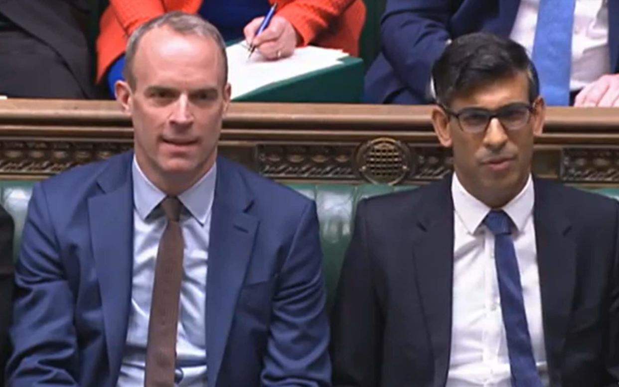 Dominic Raab sits alongside Rishi Sunak in Prime Minister's Questions, as his boss faces questions about accusations that the Justice Secretary has bullied staff - House of Commons/PA