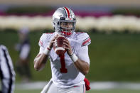 Ohio State quarterback Justin Fields looks to pass during the first half of an NCAA college football game against Northwestern Friday, Oct. 18, 2019, in Evanston, Ill. (AP Photo/Charles Rex Arbogast)