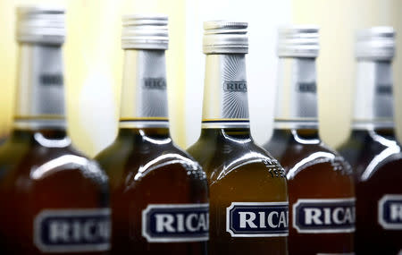 FILE PHOTO: A logo is seen on a bottle of the Ricard aniseed-flavoured beverage displayed during French drinks maker Pernod Ricard news conference to announce the company annual results in Paris, France, August 29, 2018. REUTERS/Christian Hartmann/File Photo