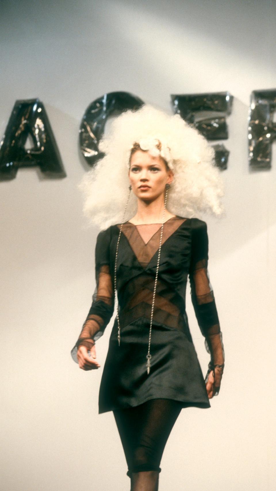 Kate Moss walking the runway during the 1994 movie, Pret a Porter