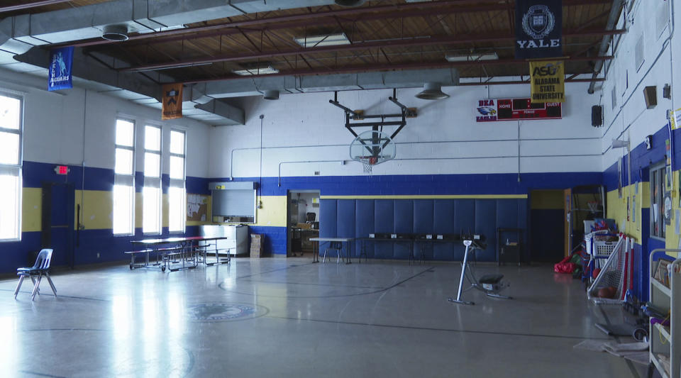 In this image made from video, an empty gymnasium is shown at David Ellis Academy in Detroit, Monday, Feb. 8, 2021. It's coming up on a year since most of the students at the pre-K through 8th grade public charter school last had an in-person school day. (AP Photo/Mike Householder)