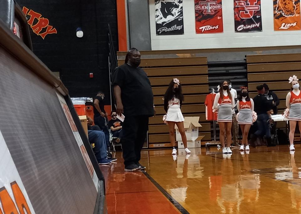 Lanphier High School girls basketball coach Doug Collins celebrated the 20th annual Orange and Black Alumni Basketball Fundraiser at Lober-Nika Gymnasium on Saturday.