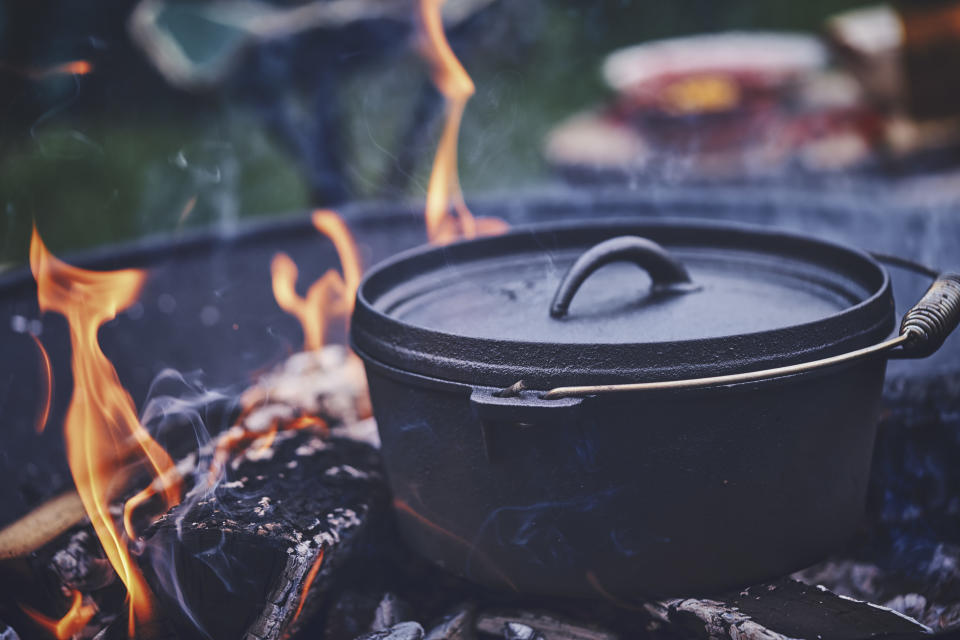 Cooking Chili Con Carne in Dutch Oven over Logfire Outside