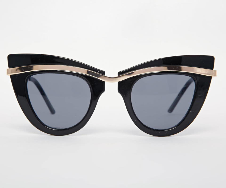 <p><a href="http://www.asos.com/ASOS/ASOS-Cat-Eye-Sunglasses-With-Built-Up-Highbrow/Prod/pgeproduct.aspx?iid=6250824&cid=17432&sh=0&pge=0&pgesize=36&sort=-1&clr=Black&totalstyles=108&gridsize=3" rel="nofollow noopener" target="_blank" data-ylk="slk:Buy them here.;elm:context_link;itc:0;sec:content-canvas" class="link ">Buy them here. </a></p>