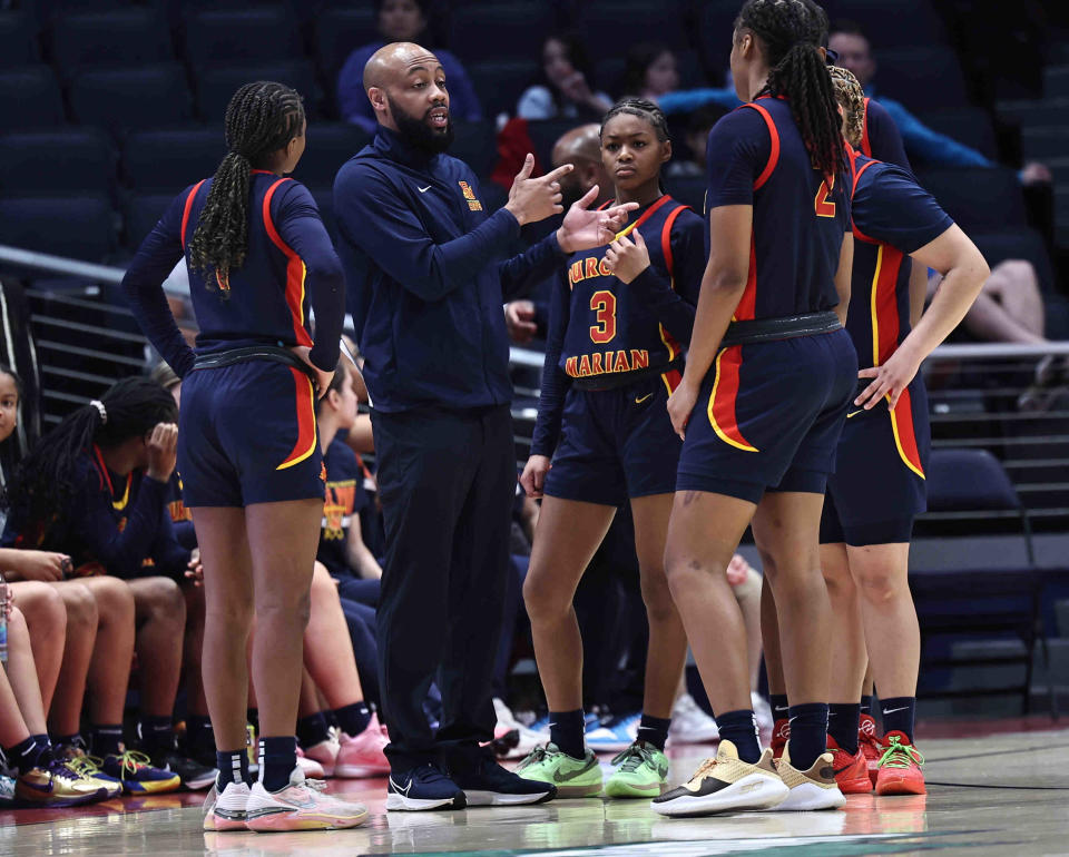 Purcell Marian will be back in Division III in girls basketball next season as the Cavaliers go for a fourth consecutive state championship.