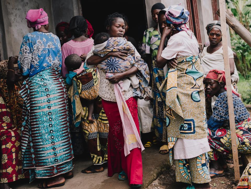 Displaced Congolese who have fled the armed rebel group M23 gather at a Doctors Without Borders station on April 4, 2024, in Kishinji, Democratic Republic of Congo.