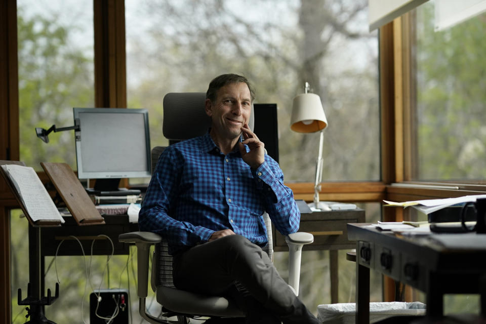 Leonard Goodman, co-owner of the Chicago Reader weekly newspaper sits for a portrait at his Chicago home Tuesday, May 10, 2022. The Reader is expected to become a nonprofit this month after the sale was nearly derailed over Goodman's column opposing COVID-19 vaccine requirements for children. Goodman said the Reader should have stood by him once the piece was published, despite disagreement about his point of view. "This is an opinion piece," he said. "It's not writing as a scientist." (AP Photo/Charles Rex Arbogast)