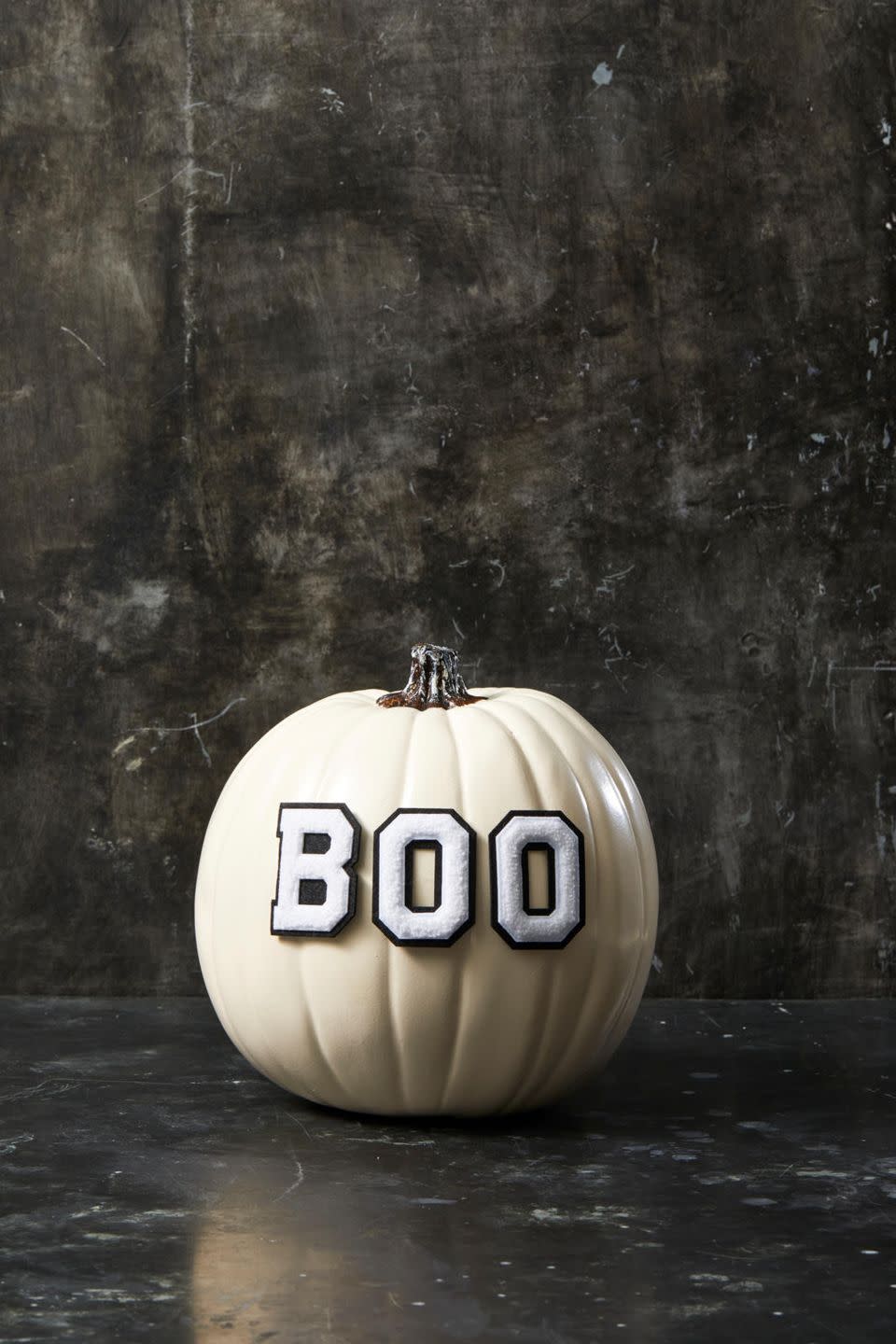 <p>How's this for easy? Simply find letter stickers or patches that suit your style and stick or hot glue them to a painted pumpkin. You're done!</p><p><a class="link " href="https://www.amazon.com/Letter-Chenille-Varsity-Iron-TR-11648/dp/B07S1Y67KY/?tag=syn-yahoo-20&ascsubtag=%5Bartid%7C10055.g.1714%5Bsrc%7Cyahoo-us" rel="nofollow noopener" target="_blank" data-ylk="slk:SHOP LETTERS;elm:context_link;itc:0;sec:content-canvas">SHOP LETTERS</a></p><p><strong>RELATED:</strong> <a href="https://www.goodhousekeeping.com/holidays/halloween-ideas/g421/halloween-decorating-ideas/" rel="nofollow noopener" target="_blank" data-ylk="slk:60+ Easy and Spooky Halloween Decorations for Fall;elm:context_link;itc:0;sec:content-canvas" class="link ">60+ Easy and Spooky Halloween Decorations for Fall</a></p>