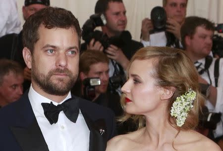 German actress Diane Kruger and Canadian-American actor Joshua Jackson arrive for the Metropolitan Museum of Art Costume Institute Gala 2015 celebrating the opening of "China: Through the Looking Glass," in Manhattan, New York May 4, 2015. REUTERS/Andrew Kelly