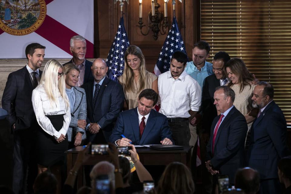 <div class="inline-image__caption"><p>Florida Governor Ron DeSantis signs three education bills on the campus of New College of Florida in Sarasota, Fla. on May 15, 2023.</p></div> <div class="inline-image__credit">Thomas Simonetti for The Washington Post via Getty Images</div>