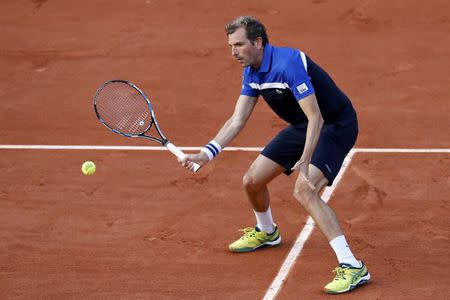 Tennis - French Open - Roland Garros - Julien Benneteau of France vs Lucas Pouille of France - Paris, France - 23/05/16. Julien Benneteau returns the ball. REUTERS/Benoit Tessier