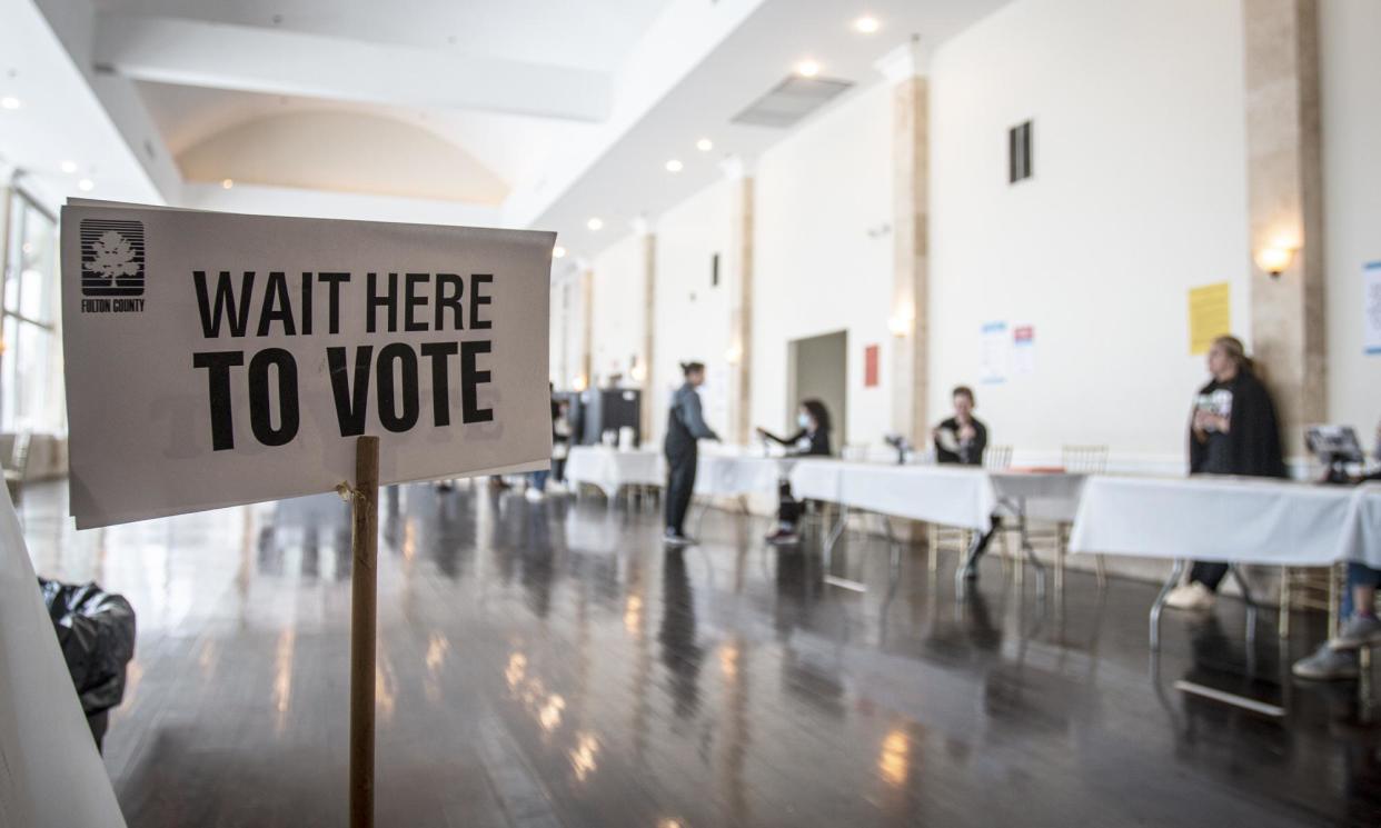 <span>A Georgia polling location during the December 2022 Senate runoff election.</span><span>Photograph: Ron Harris/AP</span>