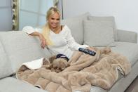 The actress and broadway star (and her dog!) love this Therapedic weighted blanket, which is meant to give the same "calming pressure as a loving hug." <strong>Buy It!</strong> $150; <a href="http://www.anrdoezrs.net/links/8029122/type/dlg/sid/PEO,ShopCelebHomes:HowtoGetJenniferAniston'sThrowPillows,TylerCameron'sSheetsandMore!,mmstein1990,Unc,Gal,5876365,202001,I/https://www.bedbathandbeyond.com/store/product/therapedic-reg-reversible-12-lb-small-weighted-blanket/5277594?keyword=therapedic-weighted-blanket" rel="nofollow noopener" target="_blank" data-ylk="slk:bedbathandbeyond.com;elm:context_link;itc:0;sec:content-canvas" class="link ">bedbathandbeyond.com</a>