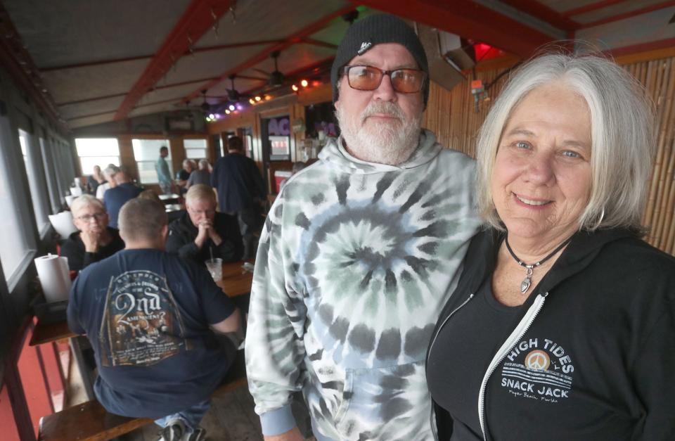 Owner Gail Holt (at right) and general manager Ted Bancroft are pictured in the dining room of High Tides at Snack Jack, a beachfront restaurant that has been a fixture for nearly 80 years in Flagler Beach. "It's still the essence of Old Florida," said Holt, who has owned the restaurant since 1992.