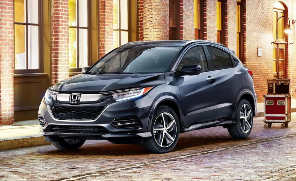 <p><a rel="nofollow noopener" href="https://www.caranddriver.com/honda/hr-v" target="_blank" data-ylk="slk:The Honda HR-V;elm:context_link;itc:0;sec:content-canvas" class="link ">The Honda HR-V</a> is based on the Fit hatchback, a tiny packaging marvel. So, it is no surprise that the HR-V's cabin is similarly flexible, with clever multi-way folding "Magic" rear seats and up to 59 cubic feet of cargo space with those seats folded flat. Unfortunately, the chassis is tuned for a soft, isolating ride, and the steering feels remote-un-Honda-like traits that join the anemic engine in delivering dynamic disappointment. For 2019, Honda finally added Apple CarPay and Android Auto integration to the infotainment system, and a much-needed physical volume knob replaced the frustrating capacitive-touch slider arrangement originally fitted.</p>