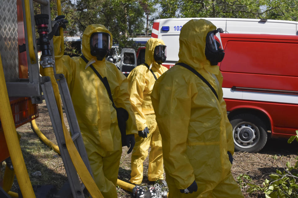 Ukrainian emergency workers wearing radiation protection suits attend training in Zaporizhzhia, Ukraine, Wednesday, June 7, 2023. The Zaporizhzhia Nuclear Power Plant, Europe’s biggest, relies in large part on water from the now-emptying reservoir at the Kakhovka dam. The U.N.’s International Atomic Energy Agency reported “no immediate risk to the safety of the plant,” whose six reactors have been shut down for months but still need water for cooling. (AP Photo/Andriy Andriyenko)