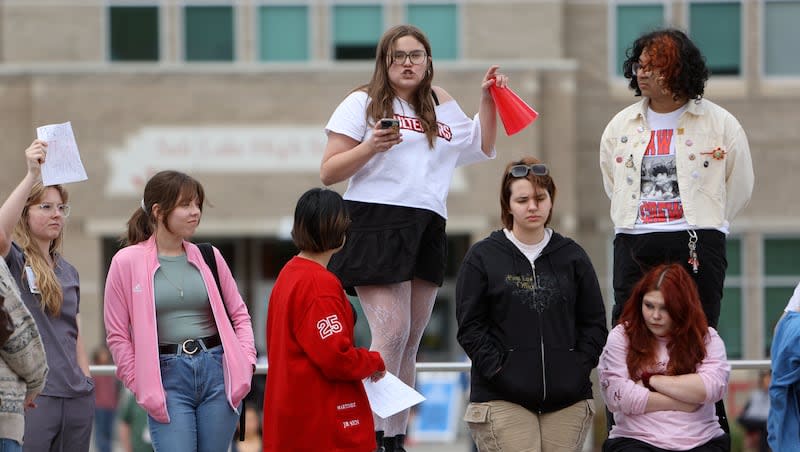 Vasey Payne, East High School junior, talks as students and faculty participate in a walk-out to protest the passage of HB257, "Sex-based designations for privacy, anti-bullying, and women’s opportunities," which limits transgender students' use of bathrooms, outside of East High School on Friday, May 3, 2024.