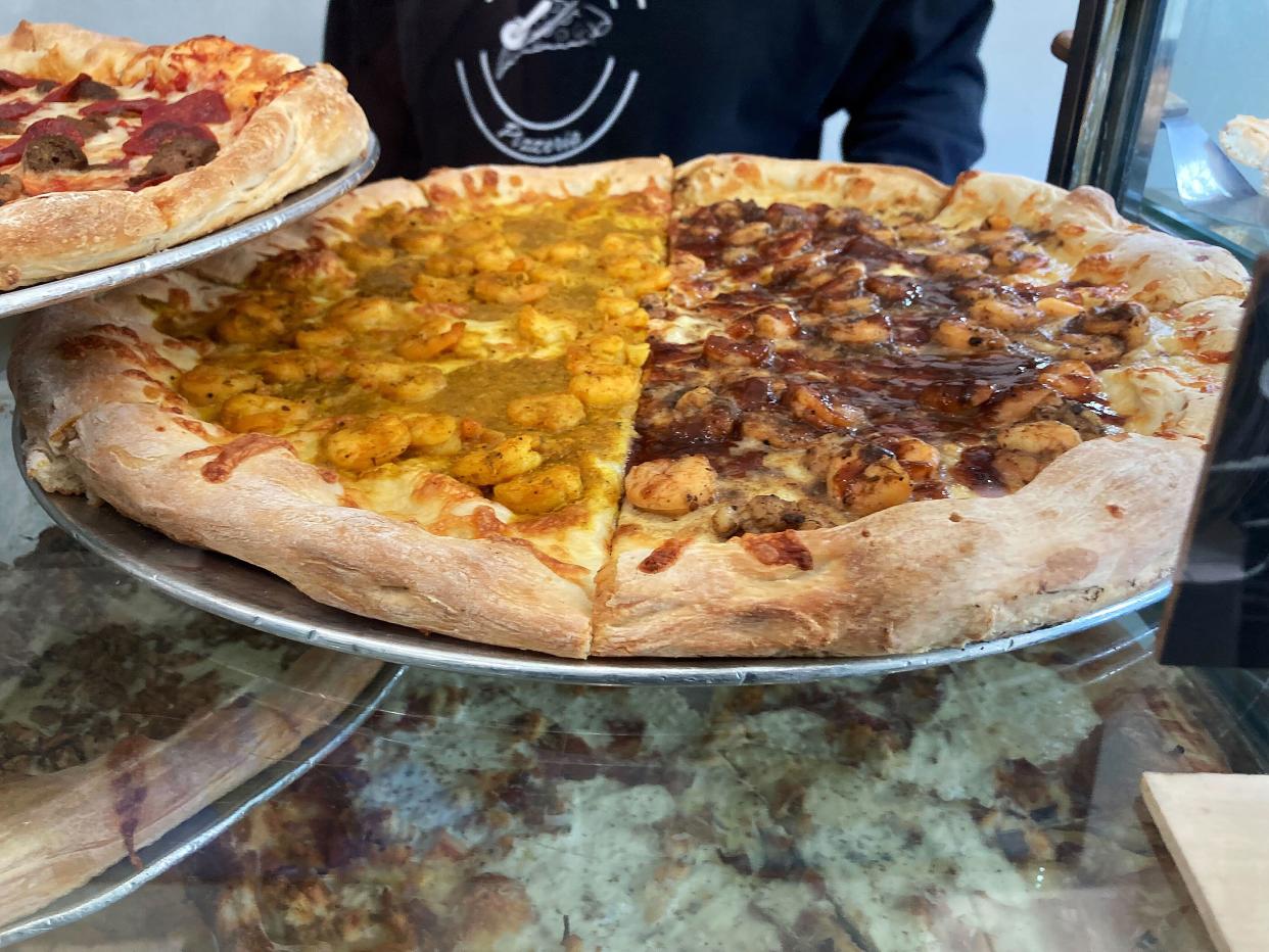 The Black-owned eatery offers unusual toppings: Jerk chicken, jerk shrimp, chicken and waffles, fried salmon diavlo, black truffle alfredo shrimp. 